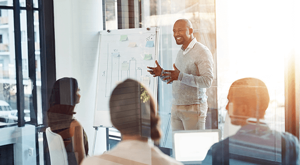 Employees attending an office presentation stock photo